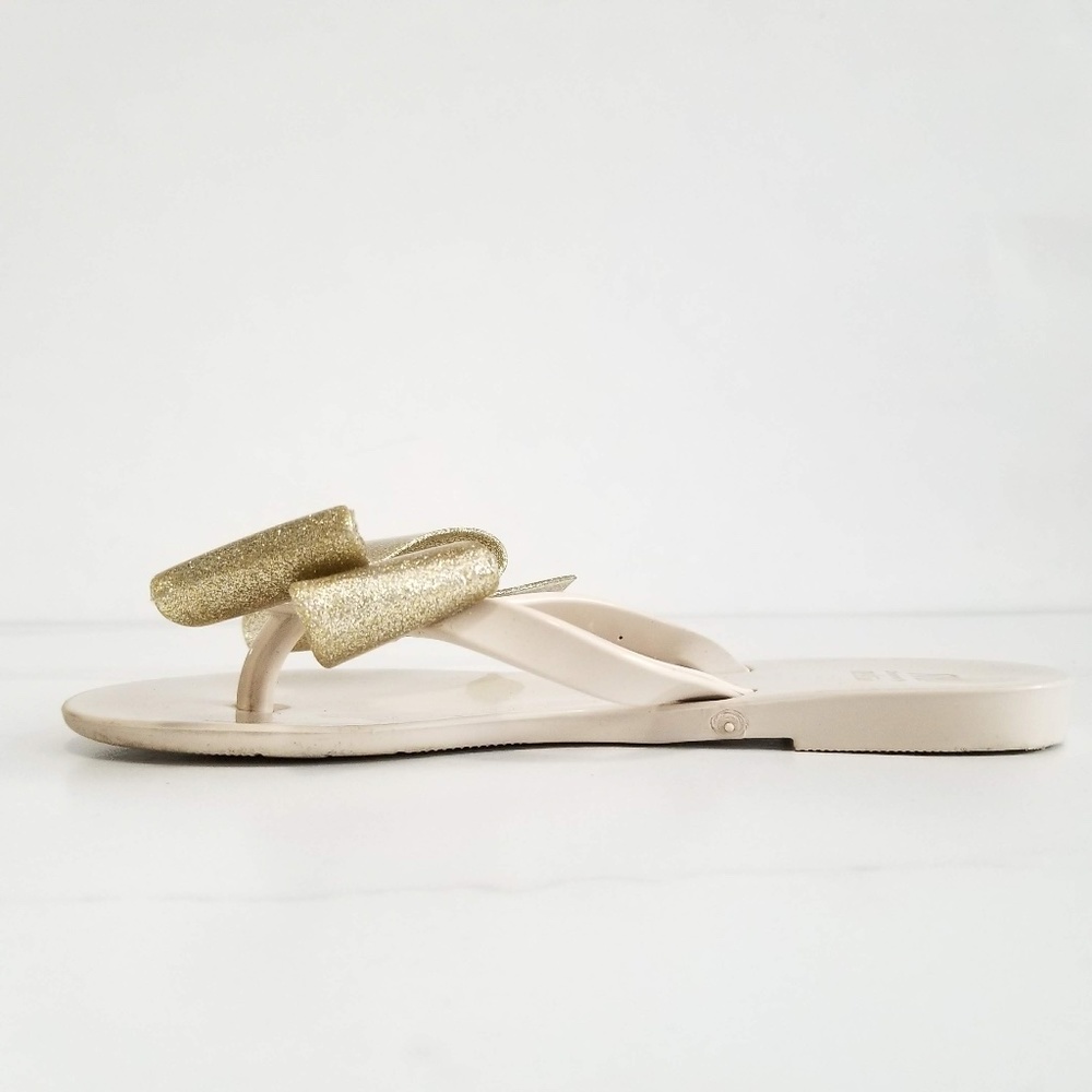 MEL by MELISSA Harmonic Gold Bow III Flip Flops - Picture 3 of 11